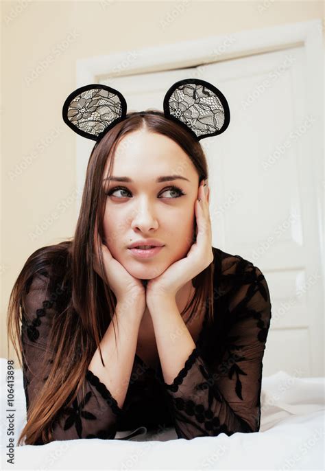 Young Pretty Brunette Woman Wearing Sexy Lace Mouse Ears Laying