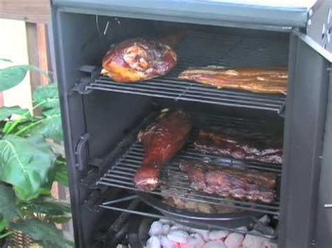The instructions say put the feet on the inside. Brinkmann Charcoal Smoker - YouTube
