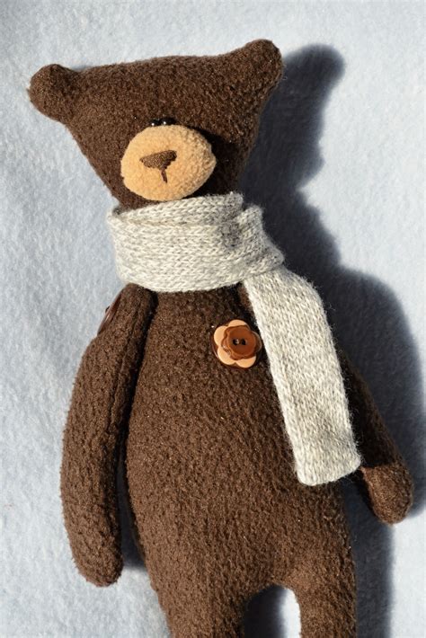 A Handmade Bear With A Scarf Made Using Inspiration From Pinterest