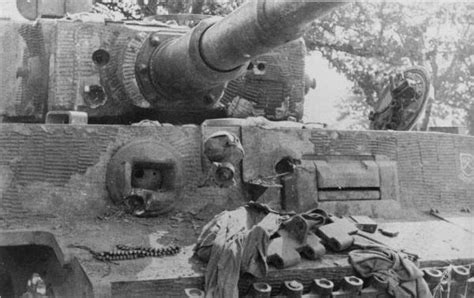 Front View Of A Tiger 1 That Has Taken Much Battle Damage Without Being