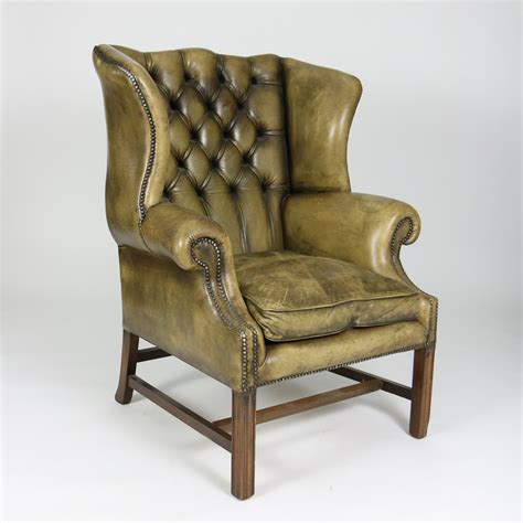 Antique green leather restored leather chairs. Tufted Green Leather Wingback Chair. Ph. (415) 355-1690