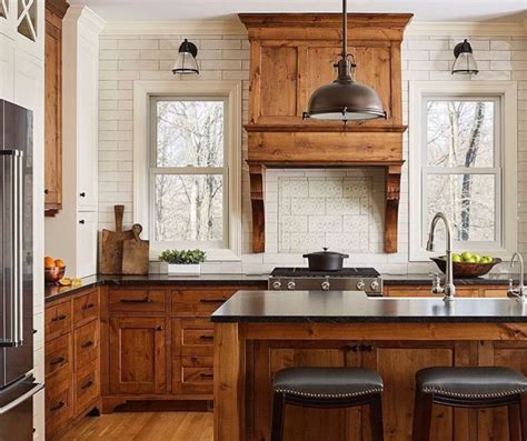 Plus, they can be stained to highlight the wood grain or painted to a smooth, lasting finish. Stained cabinets | Brown kitchen cabinets, Kitchen cabinet ...