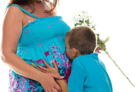 Son Kissing Pregnant Belly Of His Mother Stock Photo Image Of Love