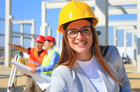 Happy Beautiful Female Architect On Construction Site Stock Image