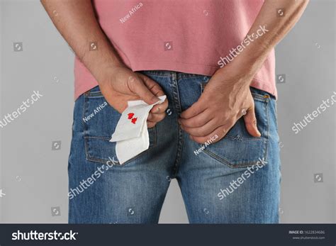 Man Holding Toilet Paper Blood Stain Stock Photo 1622834686 Shutterstock