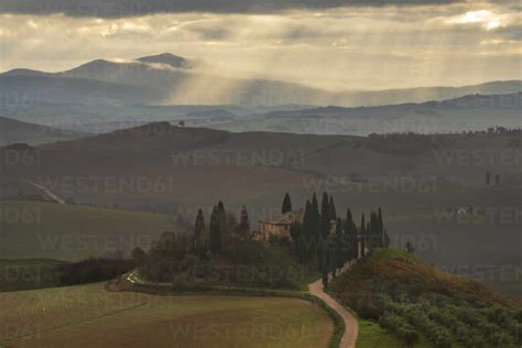 Podere Belvedere And Tuscan Countryside With Dramatic Sky San Quirico