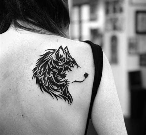 Top 43 Tribal Wolf Tattoo Ideas 2021 Inspiration Guide Tribal Tattoos