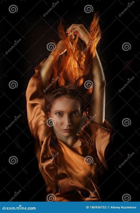 Portrait Of A Fire Woman On A Black Background Stock Photo Image Of