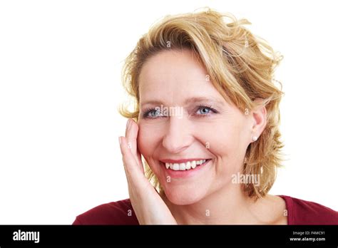 Happy Woman Touching Her Cheek With Her Hand Stock Photo Alamy