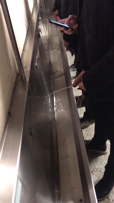 Guy Pissing Urinal