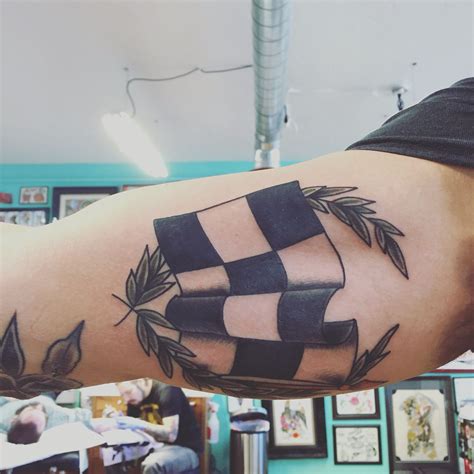 Recent Traditional Racing Flag Tattoo From Andy Canino Dedication