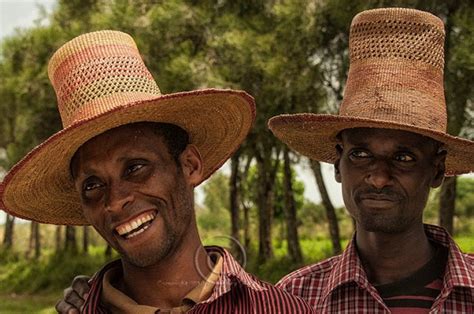 Ethiopian Farmers Wearing Their Distinctive Straw Hat Travel