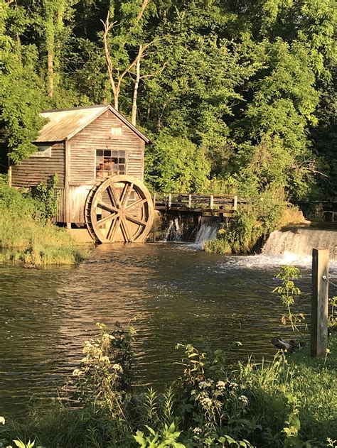 Wooden Water Wheel On River Photo Free Image On Unsplash