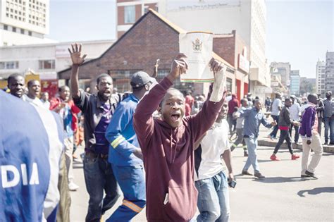 Zimbabwe Police Beat Protesters Defying Ban Oman Observer