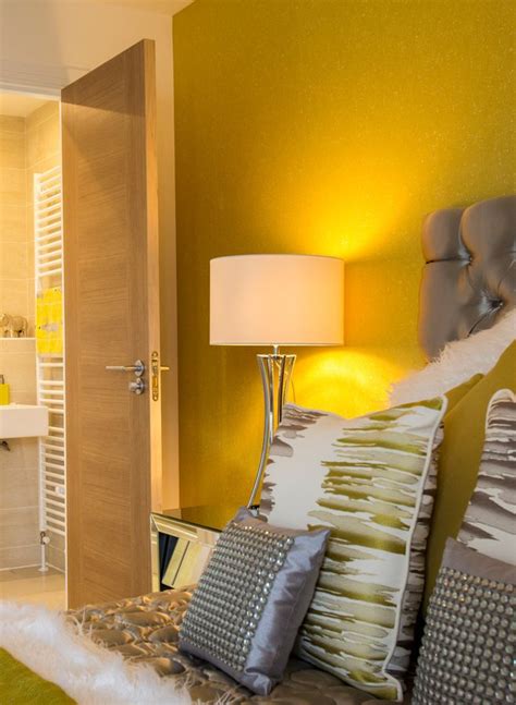 Bright Yellow Wall In A Luxurious Ensuite Master Bedroom