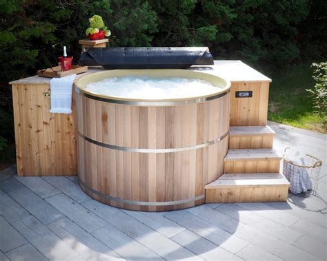 If your spa sits outside in temperatures below 50f for most of the year, you need a serious lid with some real insulation, to reduce heat loss, which the #1 thing your spa cover does, is insulate your hot tub, trapping the heat and moisture under the cover. Cedar Hot Tubs - Canadian Hot Tubs