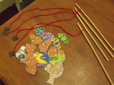 Collect the materials in adequate quantity. Magnetic Fishing Game - My Kid Craft