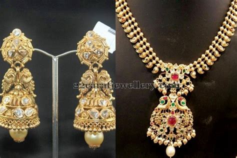 Simple Gold Set Antique Jhumkas Jewellery Designs