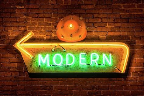 Vintage Neon Arrow Sign On Brick Wall Photograph By