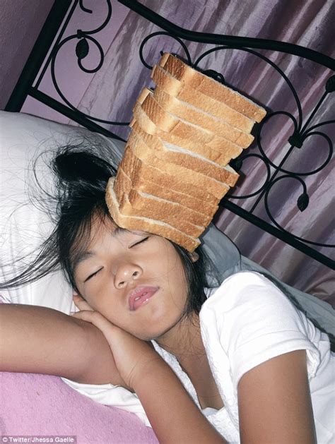 Sister Gets Revenge By Stacking A Loaf Of Bread On Her Sleeping Sibling