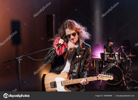 Rock Band On Stage — Stock Photo © Tarasmalyarevich 150800998