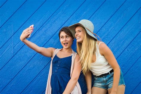 Premium Photo Two Girls Taking Selfie