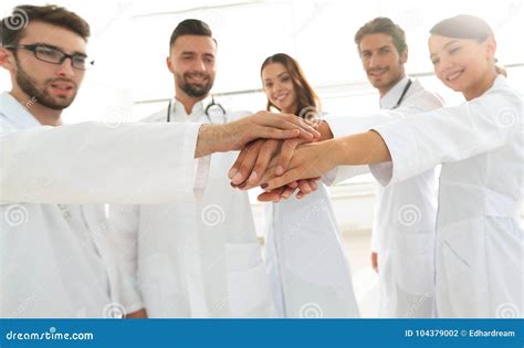 Doctors And Nurses In A Medical Team Stacking Hands Stock Photo Image