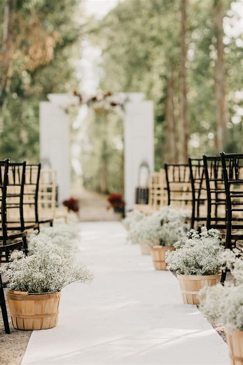 Cranberry Hued Winter Wedding With A Spectacular Ceremony Backdrop