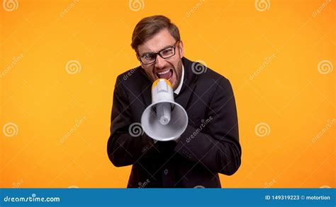 Angry Boss Shouting At Employees Using Megaphone Harassment At Work