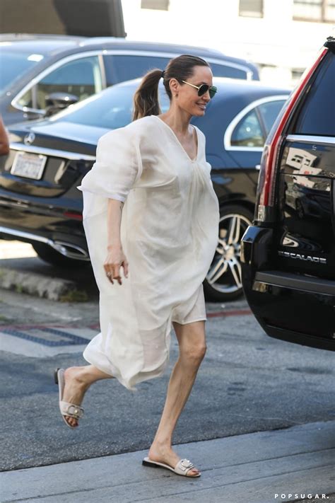 angelina jolie white dress and slides 2019 popsugar fashion