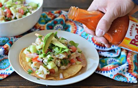 The shrimp is first marinated in lime juice and mixed with tomato, cilantro, and onion. Shrimp Ceviche - Easy, Mexican Style Ceviche Recipe