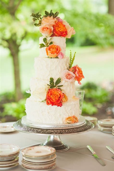 Buttercream Wedding Cake With Coral Roses