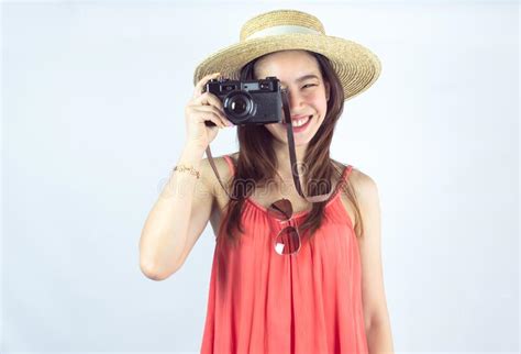 Asian Woman Holding Camera For Travelling On Summer Trip Stock Image