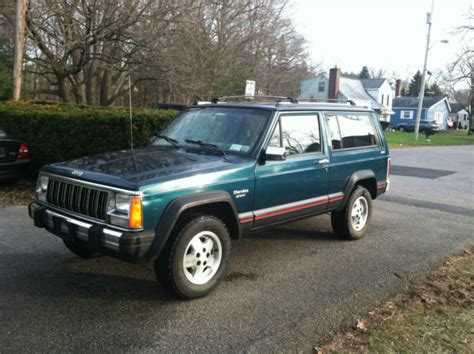 You are looking at a 1995 jeep cherokee country. 1995 Jeep Cherokee XJ Sport 4x4 2 Door 5 speed manual