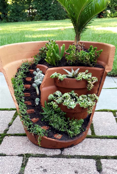When it comes to making your very own broken pot fairy garden, the sky really is the limit. this dish garden has a half broken pot that looks like ...