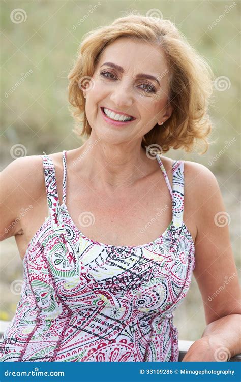 Portrait Of A Beautiful Older Woman Smiling Outdoors Stock Photo Image Of Mature Leisure