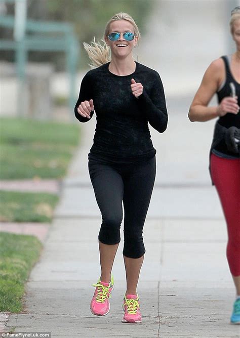 reese witherspoon shows off her toned figure in black workout gear daily mail online