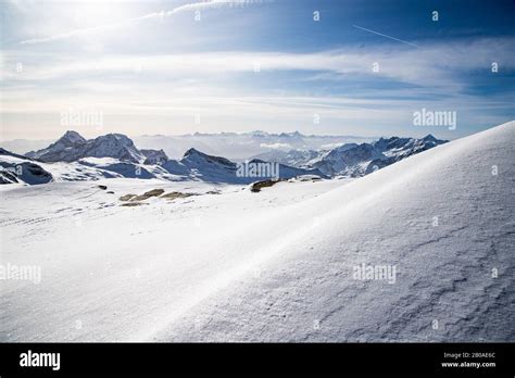 Snow Covered Peaks In The Swiss Alps Stock Photo Alamy