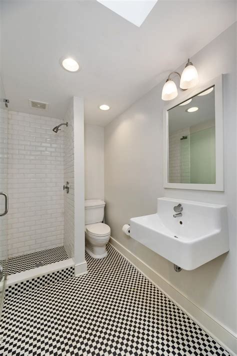 From wikipedia, the free encyclopedia. Small Bathroom With Black-and-White Checkered Floor | HGTV