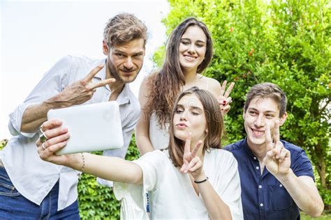 Group Of Young Friends Take A Selfie Hugged Together Stock Image Image Of Caucasian