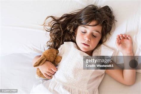 Sleeping Girl Long Hair Photos And Premium High Res Pictures Getty Images