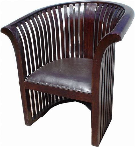 Design sessel bringen fashion in das zuhause. Zeitlos schön ist dieser Sessel aus Teakholz und Leder im Kolonialstil. | Teak holz, Teak ...