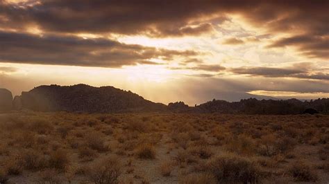 Dusty Desert At Sunset Rocks Desert Mountains Dust Sunset Shrubs