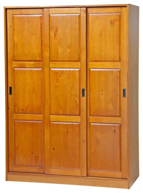 A wardrobe or armoire is a standing closet used for storing clothes.the earliest wardrobe was a chest, and it was not until some degree of luxury was attained in regal palaces and the castles of powerful nobles that separate accommodation was provided for the apparel of the great. 100% Solid Wood 3-Sliding Door Wardrobe/Armoire/Closet - Transitional - Armoires And Wardrobes ...