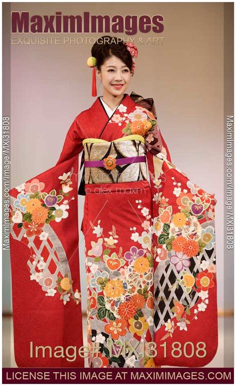 Photo Of Japanese Woman In A Beautiful Red Kimono With A Colorful