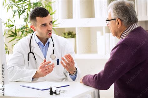 Doctor Talking With Patient Stock Photo Adobe Stock