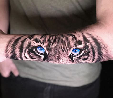 Share 73 Tiger With Blue Eyes Tattoo Super Hot In Cdgdbentre