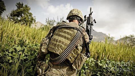 Us Army Mk48 Machine Gunner Patrols Photograph By Stocktrek Images
