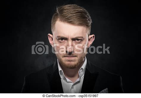 Elegant Young Man In Suit Looking Frowning Elegant Young Man In Suit