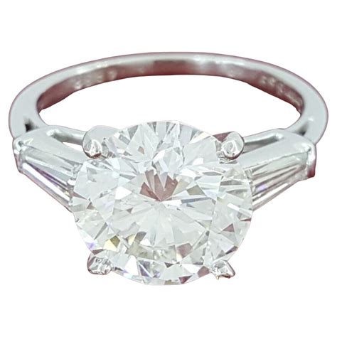 Cartier Four Stone Round Brilliant Cut Diamond Ring At 1stDibs Four